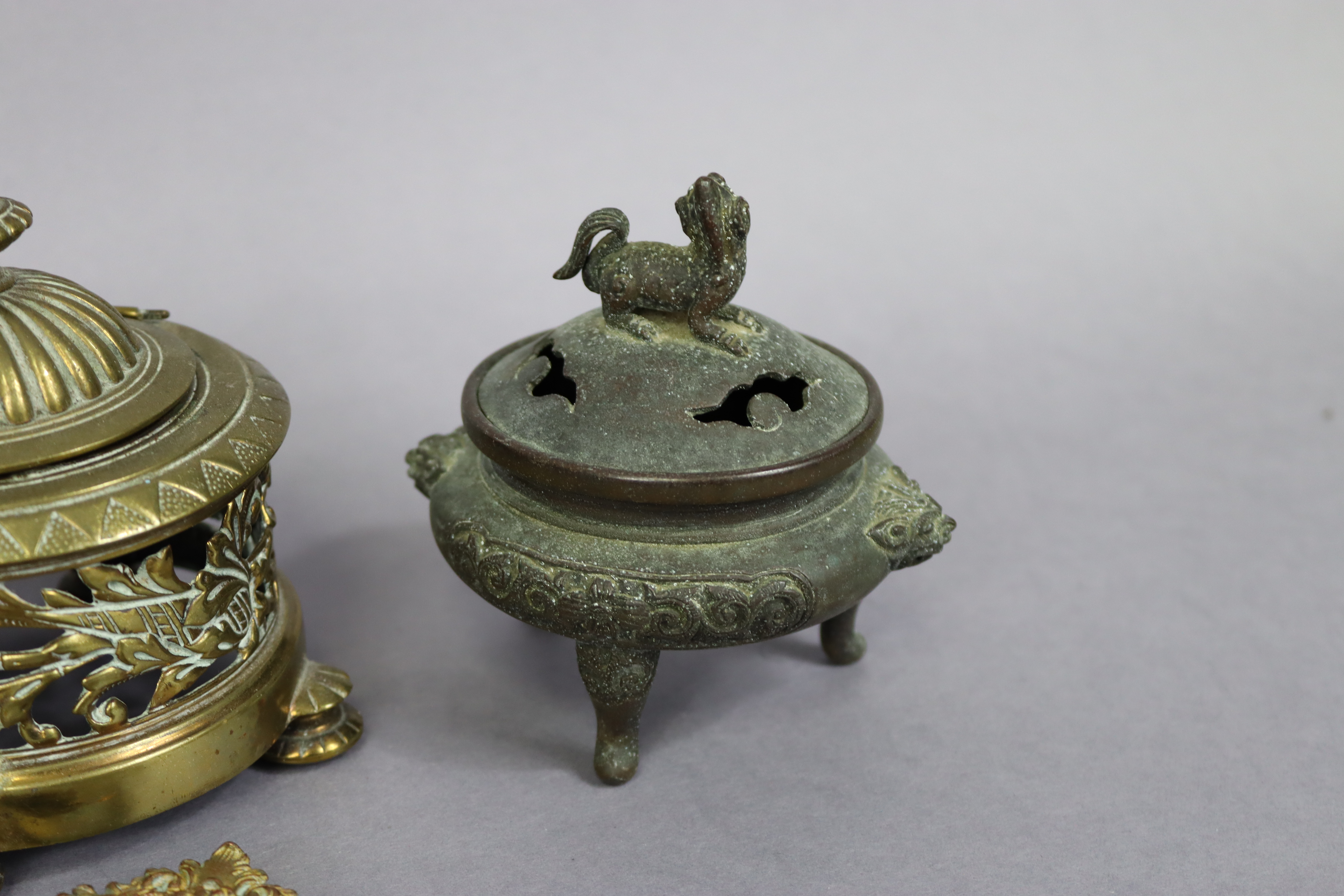 A Chinese bronze incense burner of squat round form, having foo-dog finial to the lid, & on three - Image 2 of 6