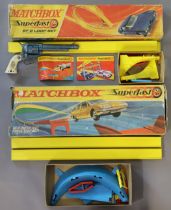 A 1950’s Lone Star “Range Ride” MKII child’s cap gun, and two matchbox superfast models “SF-2”