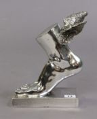 A silvered-finish composition “Mercury winged foot” on a rectangular plinth base, 24.5cm high.