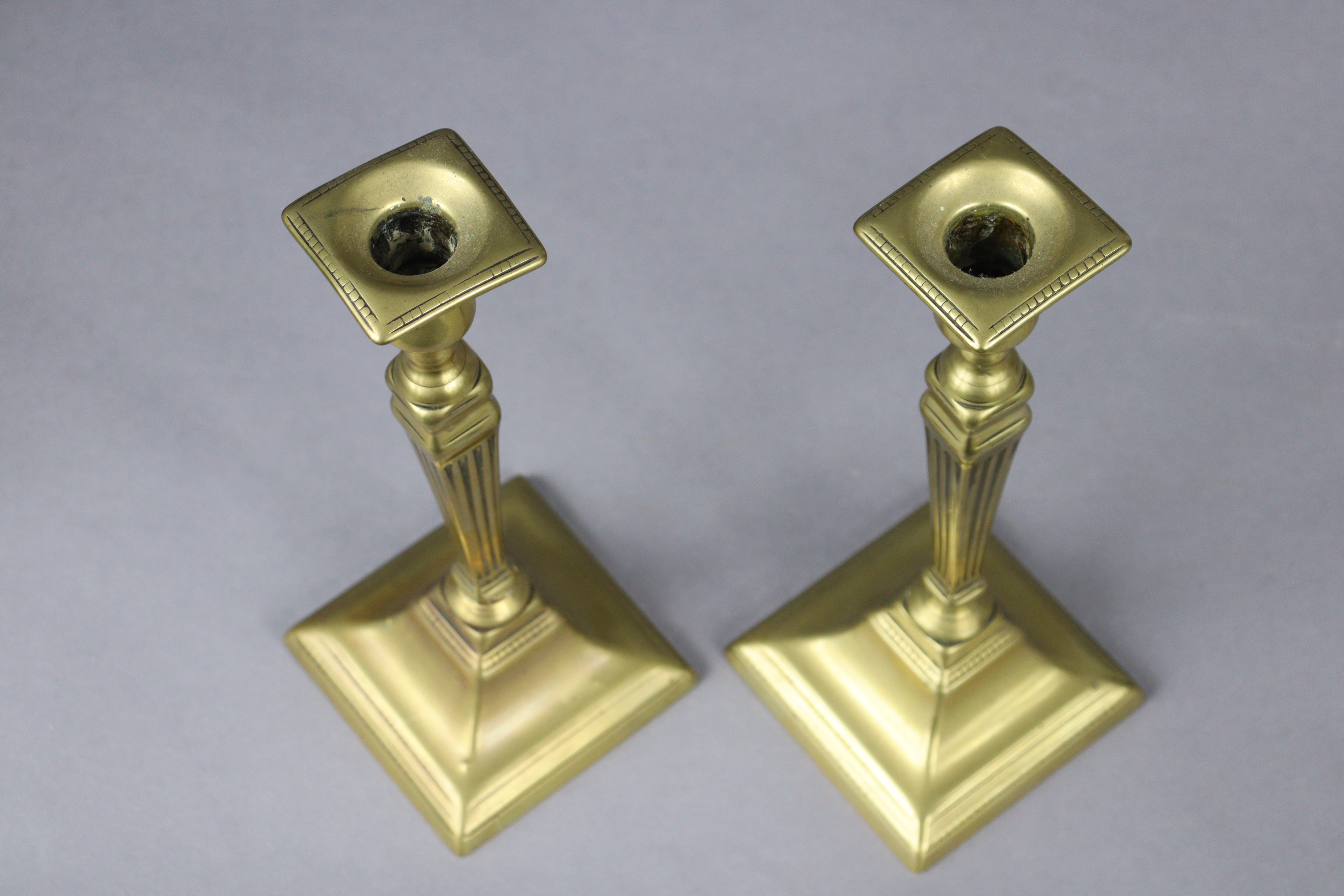 An 18th century brass candlestick, 20cm high; two pairs of Victorian candlesticks, 26.5cm & 24.5cm - Image 3 of 8