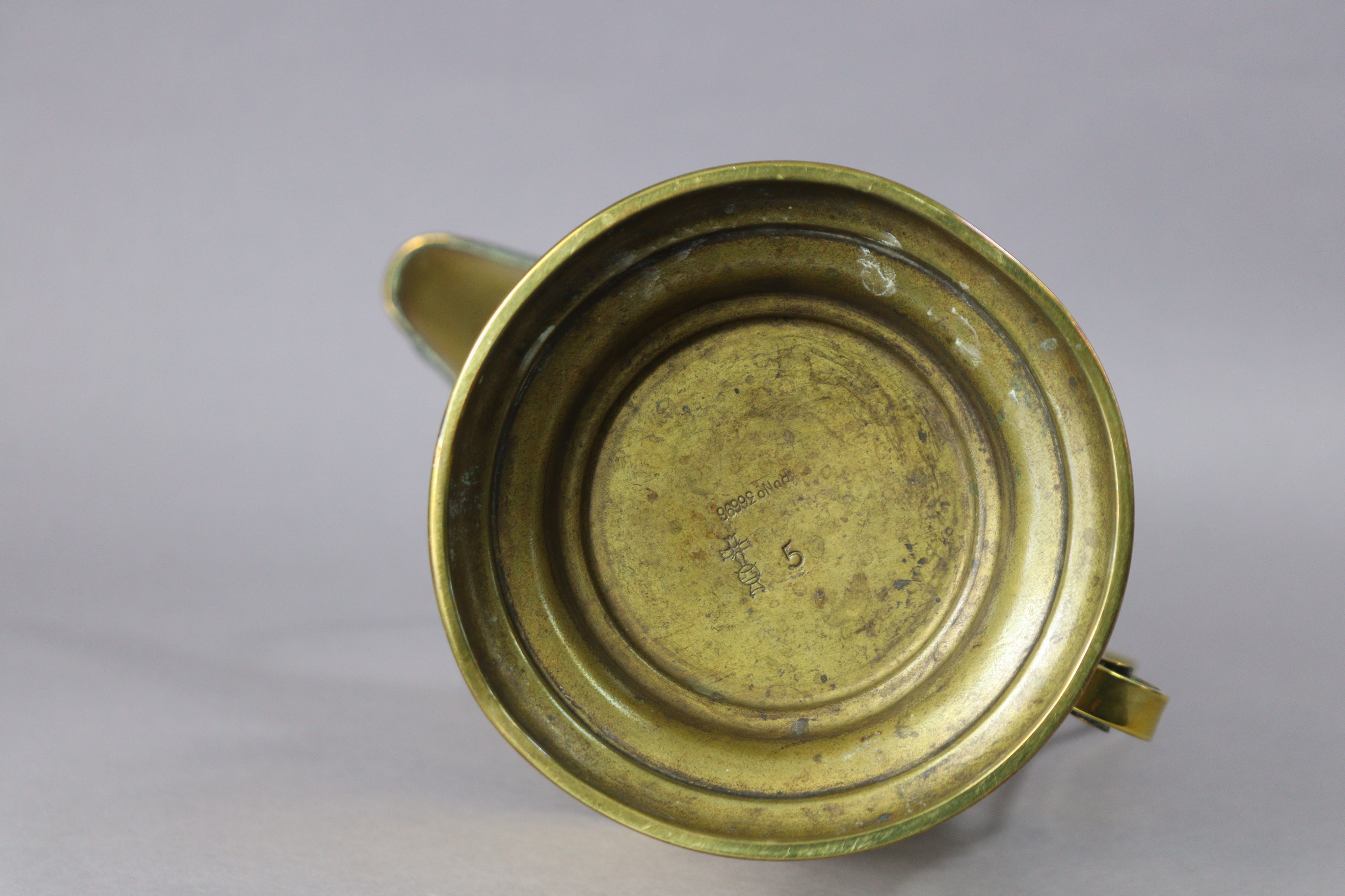 A late 19th century brass water jug designed by Christopher Dresser for Benham & Froud, with - Image 7 of 7