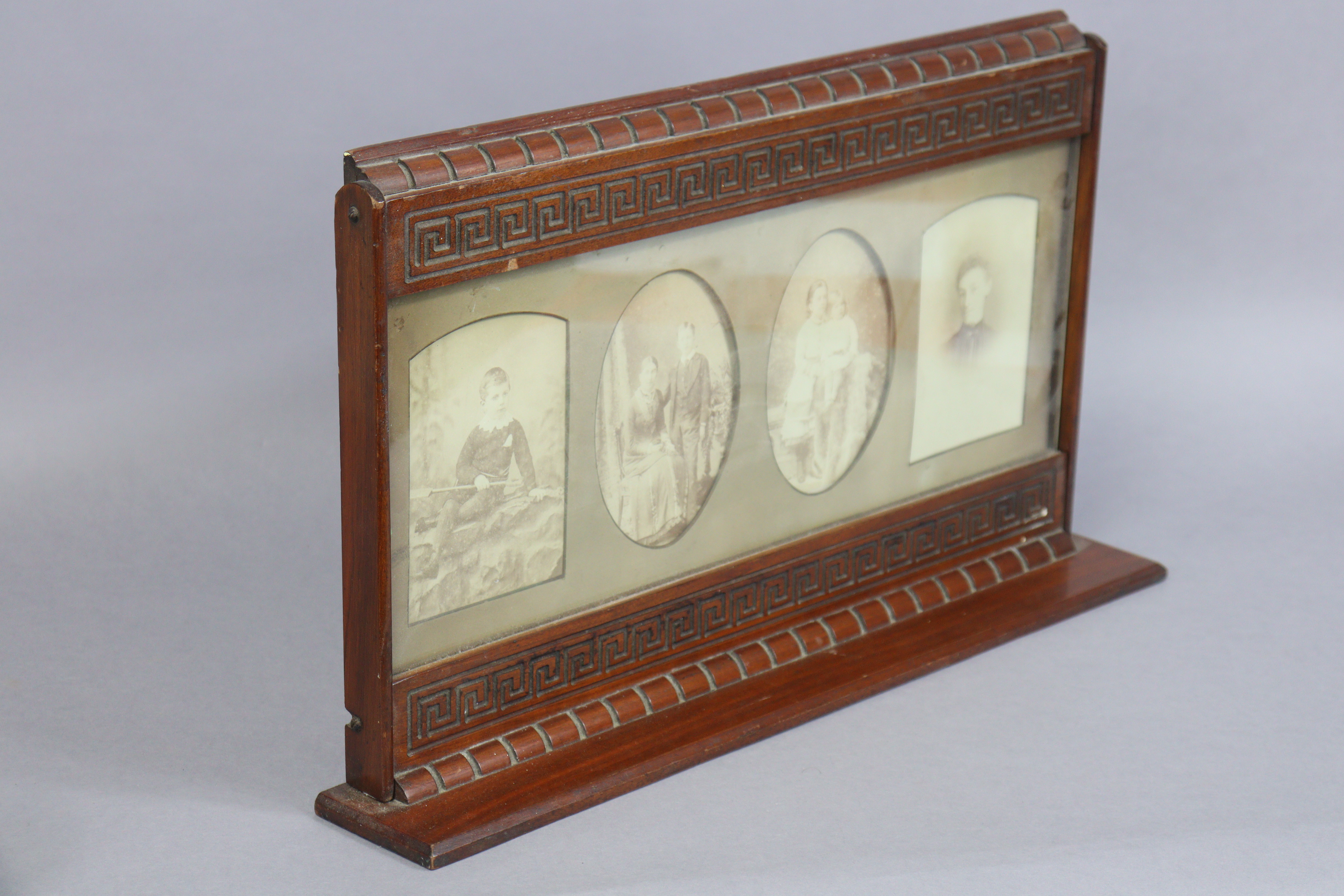 A late 19th/early 20th century carved mahogany table standing photograph frame, 54cm wide x 31cm - Image 3 of 6