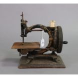 A late 19th century “Monarch” sewing machine by Smith & Co. of London, 28.5cm long, uncased.