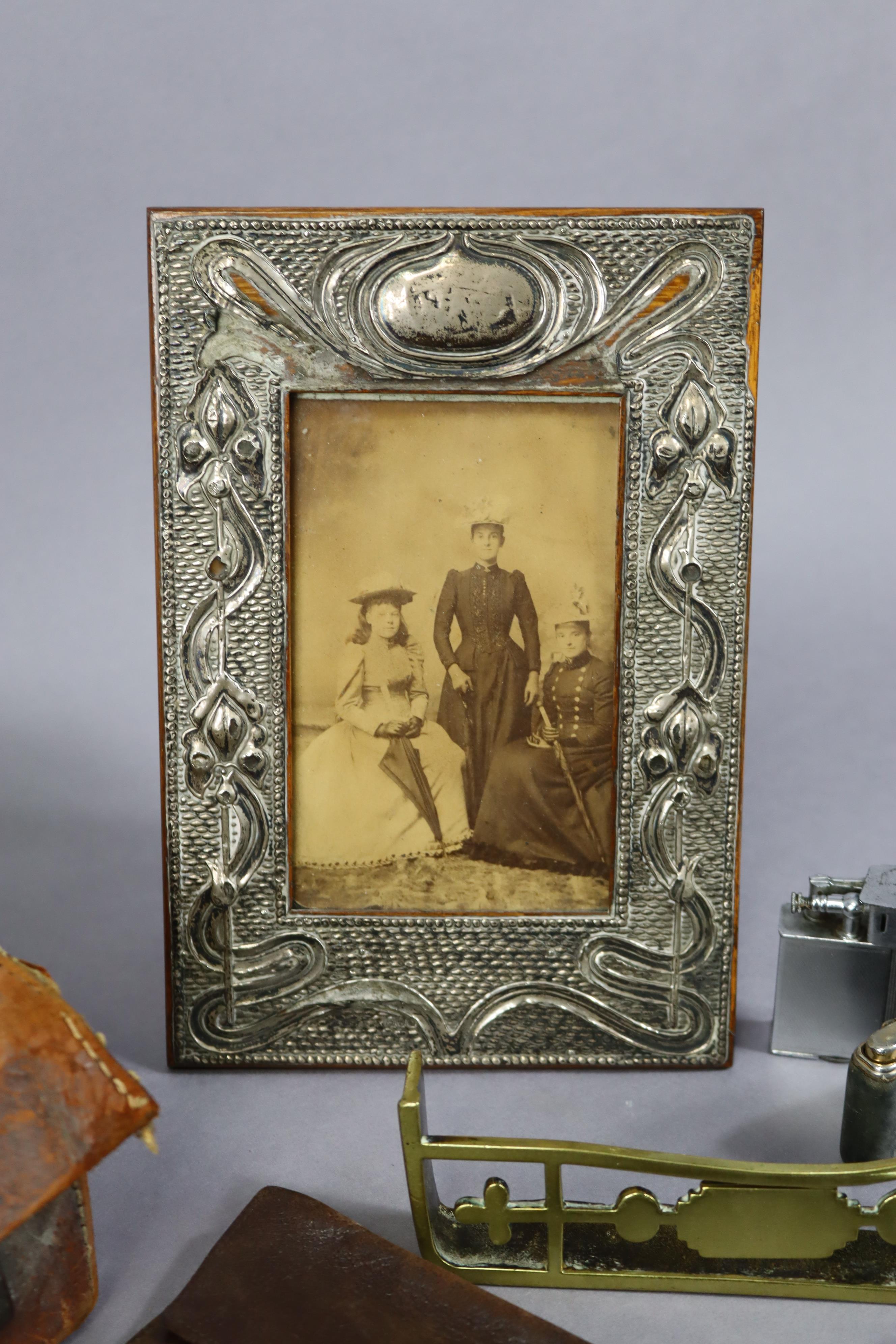 A vintage silver photograph frame, 22.5cm x 15cm (internal size), w.a.f.; a miniature brass - Image 2 of 8