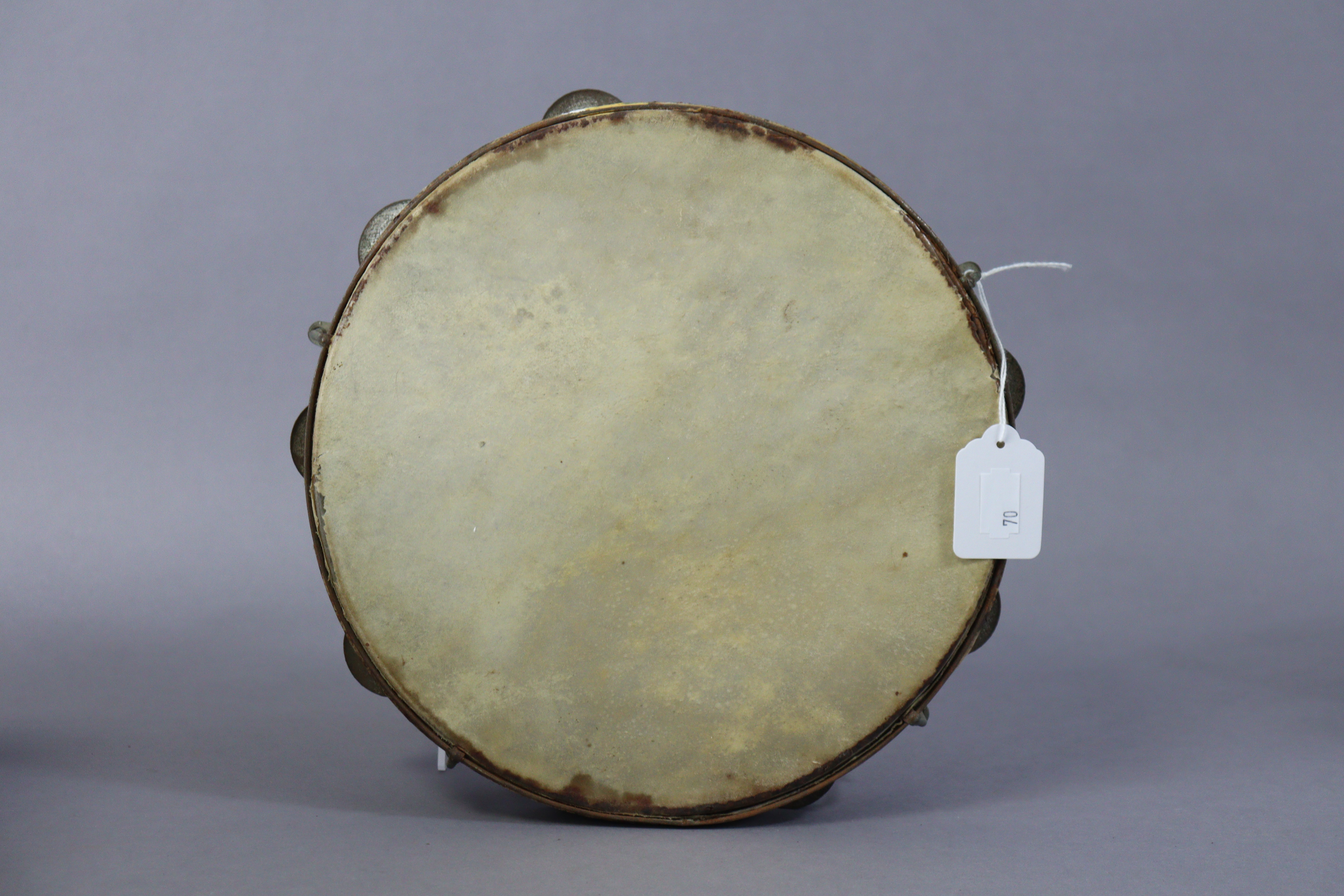 A Ridgmount portable gramophone in a cream finish fibre-covered case; together with a tambourine. - Image 5 of 7