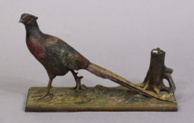 A cold painted bronzed novelty pheasant & three-stump match-striker on a rectangular base, 331cm
