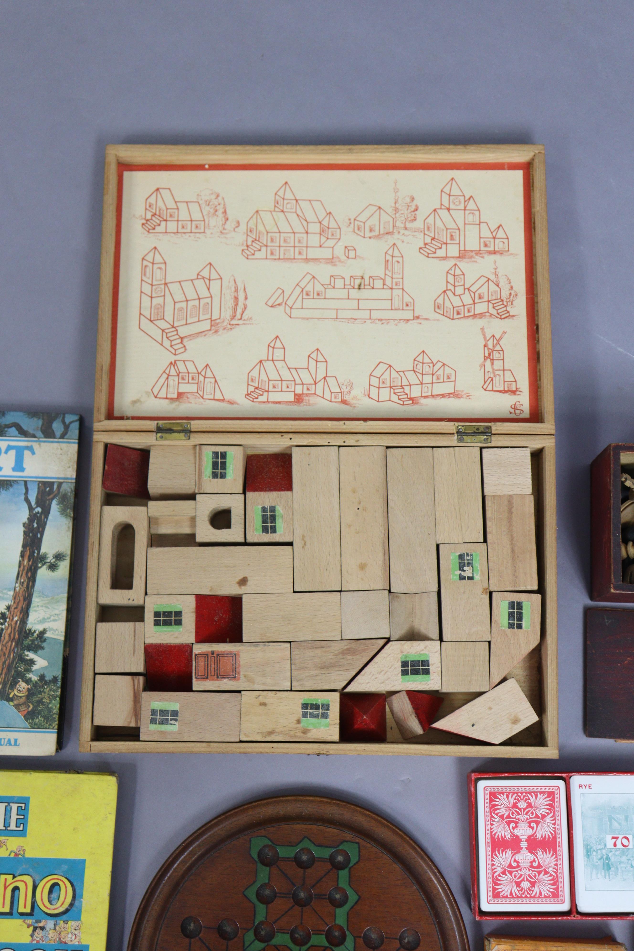 A vintage “Mon Village” child’s construction set, boxed, a treen part chess set, various soldier - Image 2 of 6