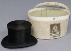 A vintage black silk top hat; & a cardboard hatbox (hatbox w.a.f.).