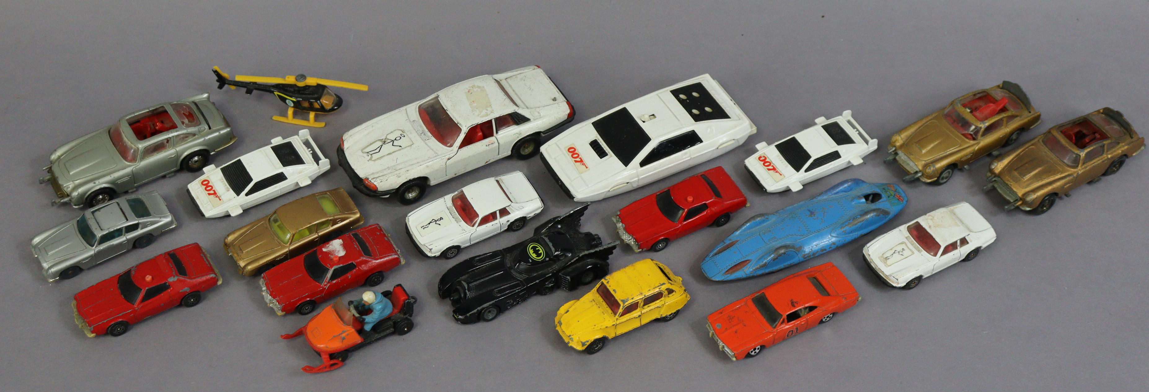 Six various James Bond scale model cars; together with fourteen various other scale models, all