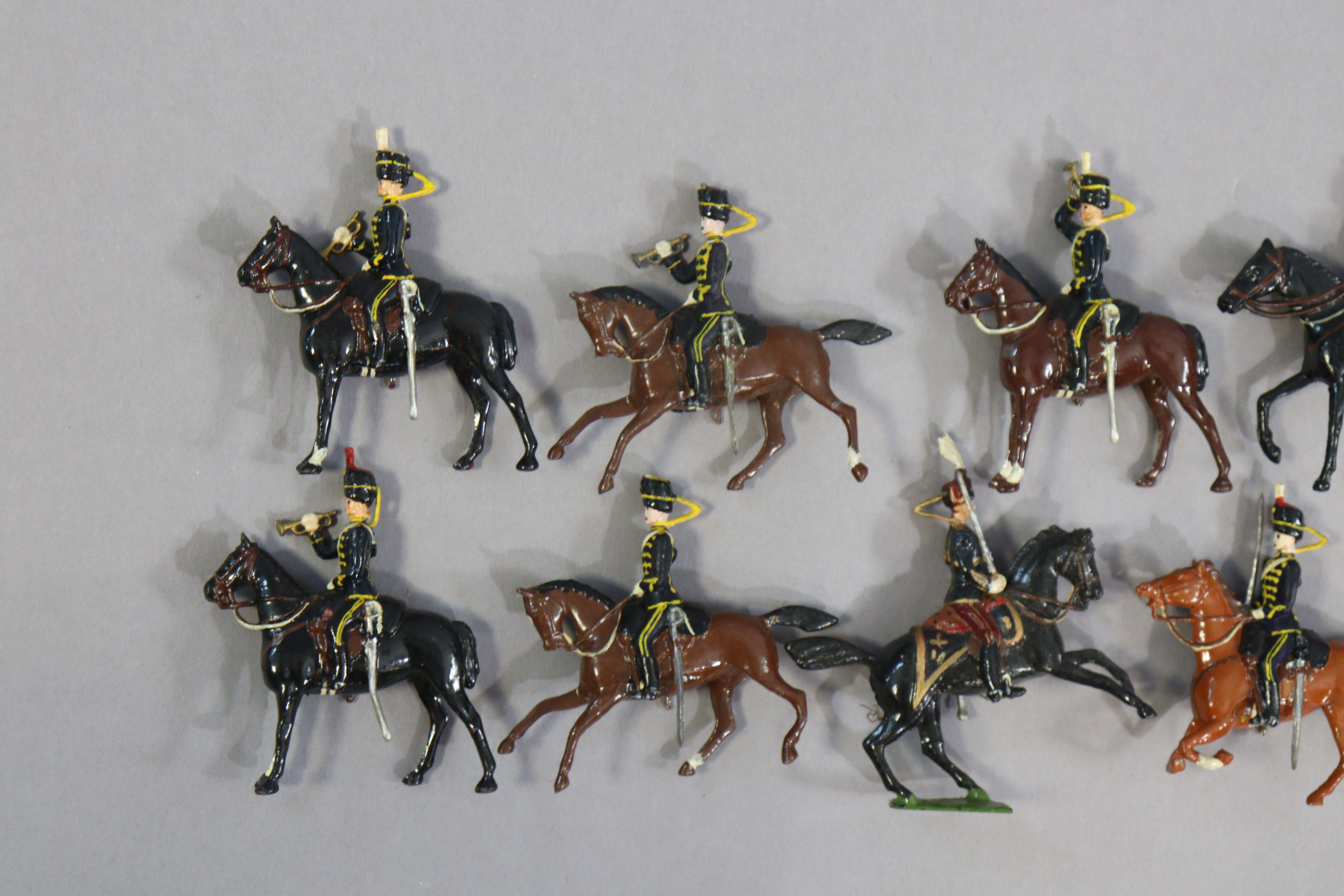 Twelve Britain’s painted lead equestrian soldier figures. - Image 2 of 3