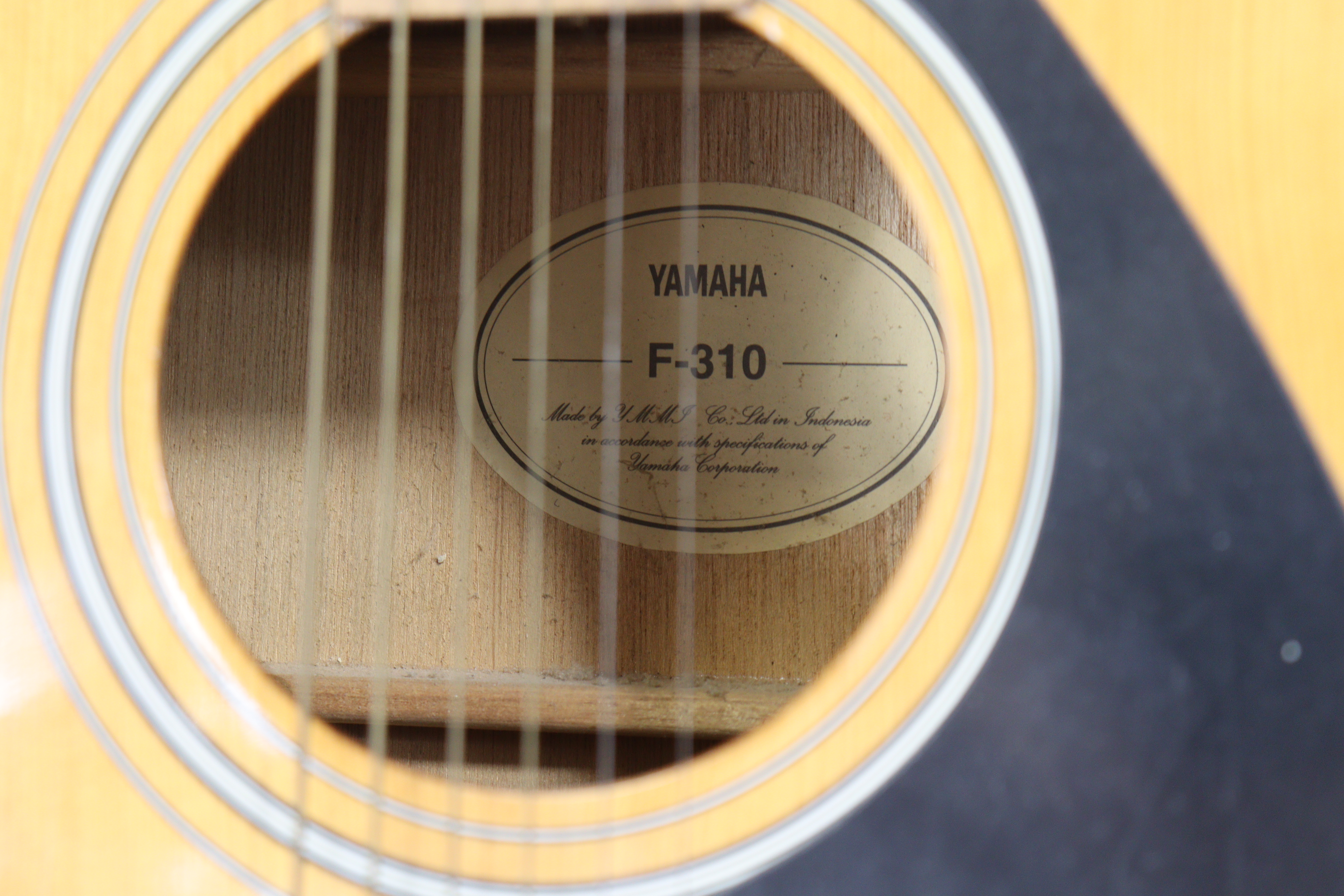A Yamaha “F-310” six-string acoustic guitar (lacking case). - Image 3 of 6