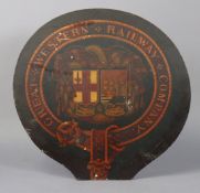 A painted wooden panel of circular form & inscribed “GREAT WESTERN RAILWAY COMPANY” (slight faults),
