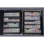 A collection of commonwealth & world stamps on stock leaves, in three ring-binder albums.