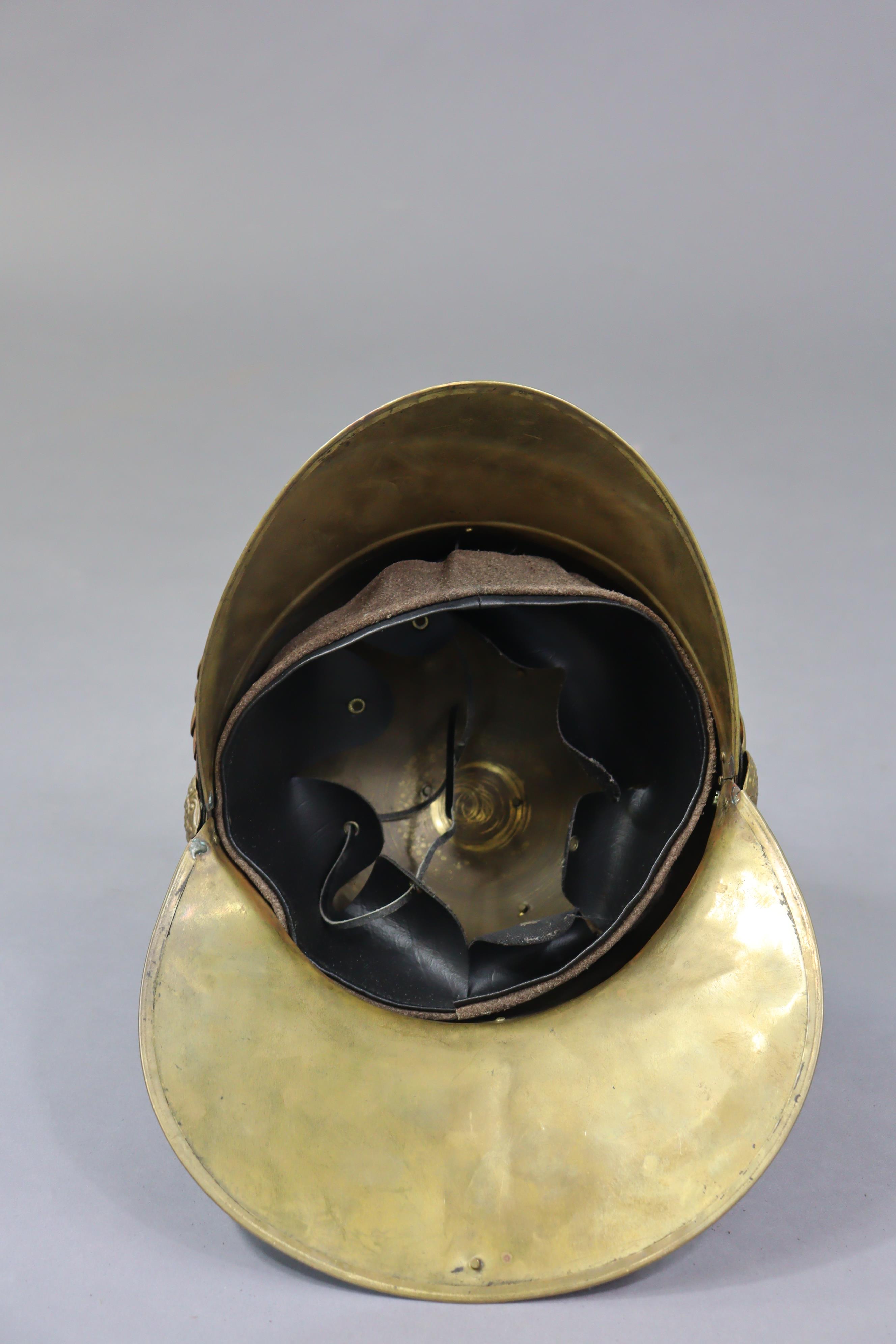 A replica Merryweather pattern brass fire men’s helmet. - Image 4 of 4
