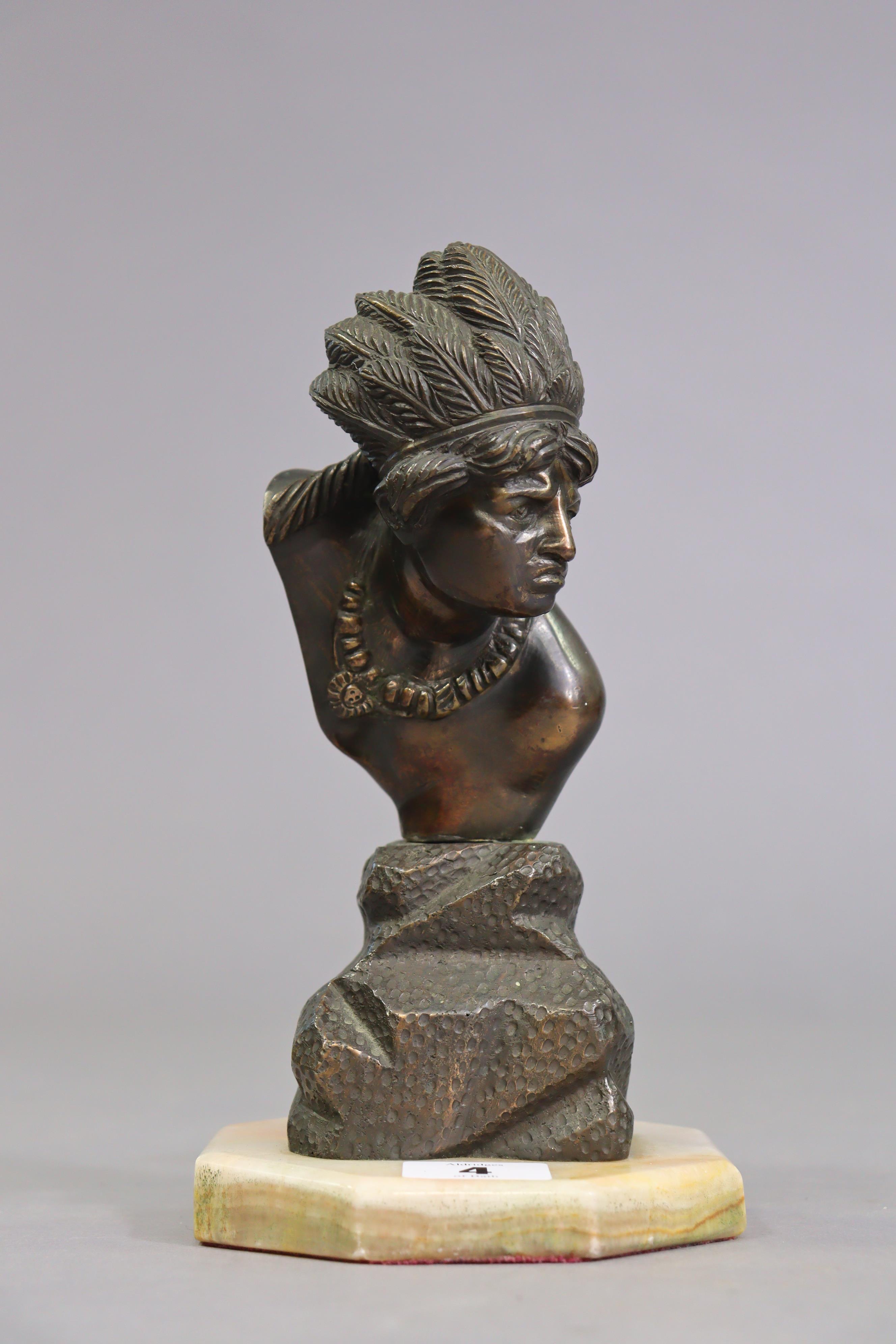 A bronzed Indian chief’s bust sculpture mounted on an onyx octagonal plinth, 22cm high. - Image 2 of 6