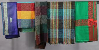 Two Ethiopian floral embroidered shawls; & three Donegal blankets.
