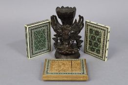 Three 19th century eastern sandalwood card cases (one with pencil inscription dated 1881); & an