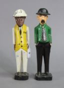 Two painted & carved wooden standing male figures, 32cm & 33cm high.