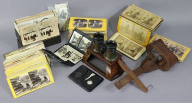 A Brewster-type stereo-card viewer, a Holmes-type ditto, two other stereo-card viewers, and