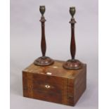 A pair of late 19th/early 20th century treen & bronzed metal candlesticks each with a baluster-