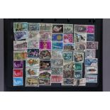 A collection of world stamps in two ring-binder albums; various loose Windsor album leaves with GB