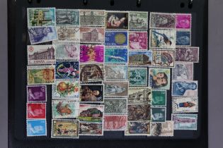 A collection of world stamps in two ring-binder albums; various loose Windsor album leaves with GB