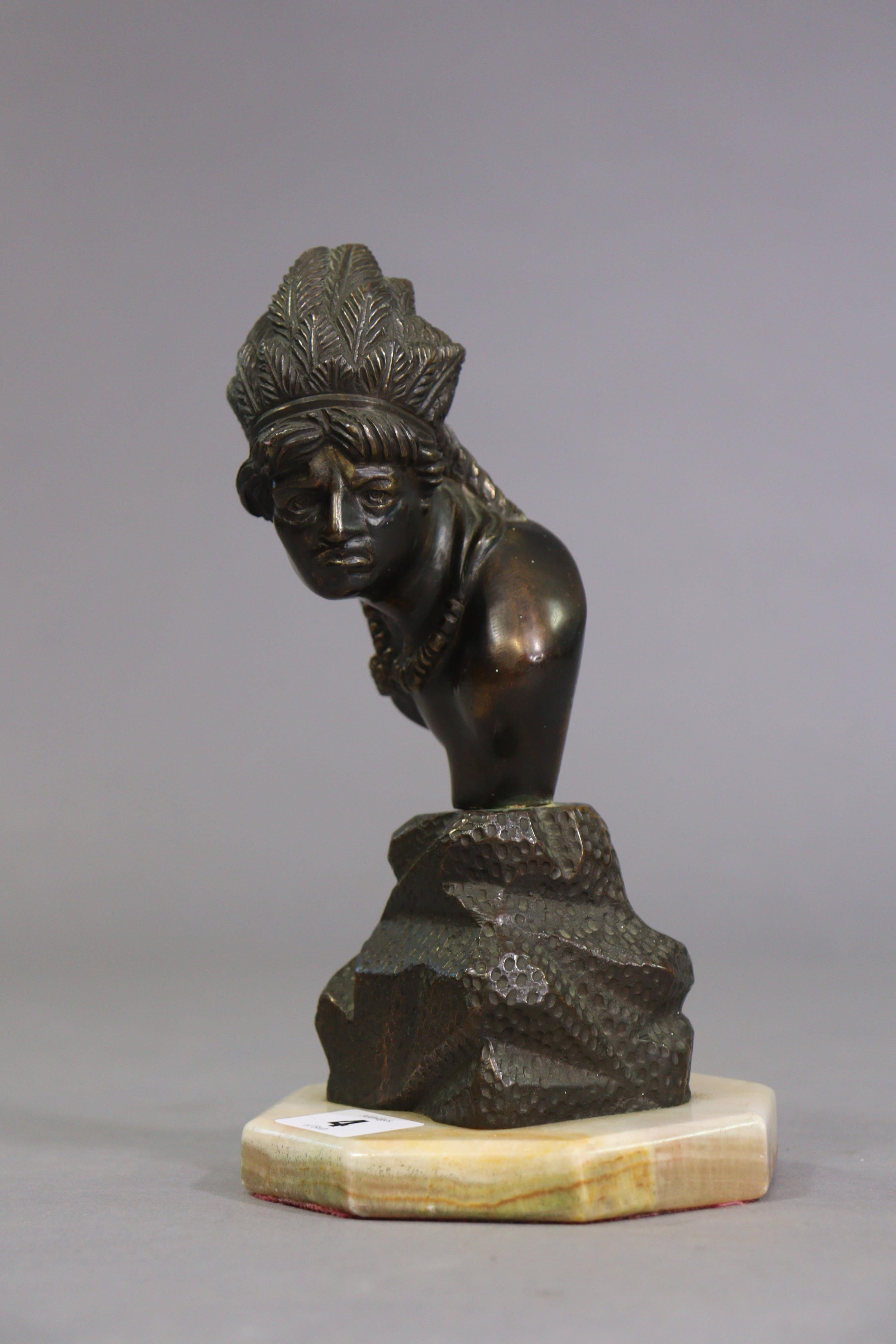 A bronzed Indian chief’s bust sculpture mounted on an onyx octagonal plinth, 22cm high. - Image 3 of 6