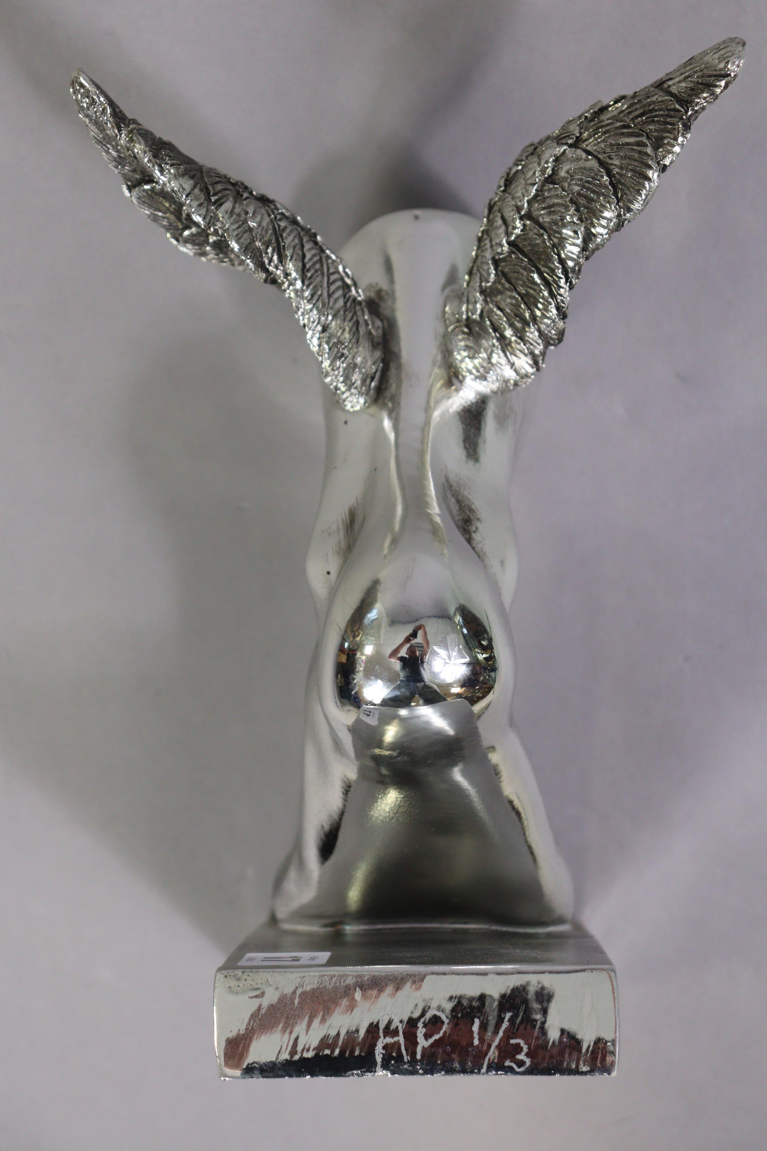 A silvered-finish composition “Mercury winged foot” on a rectangular plinth base, 24.5cm high. - Image 3 of 3