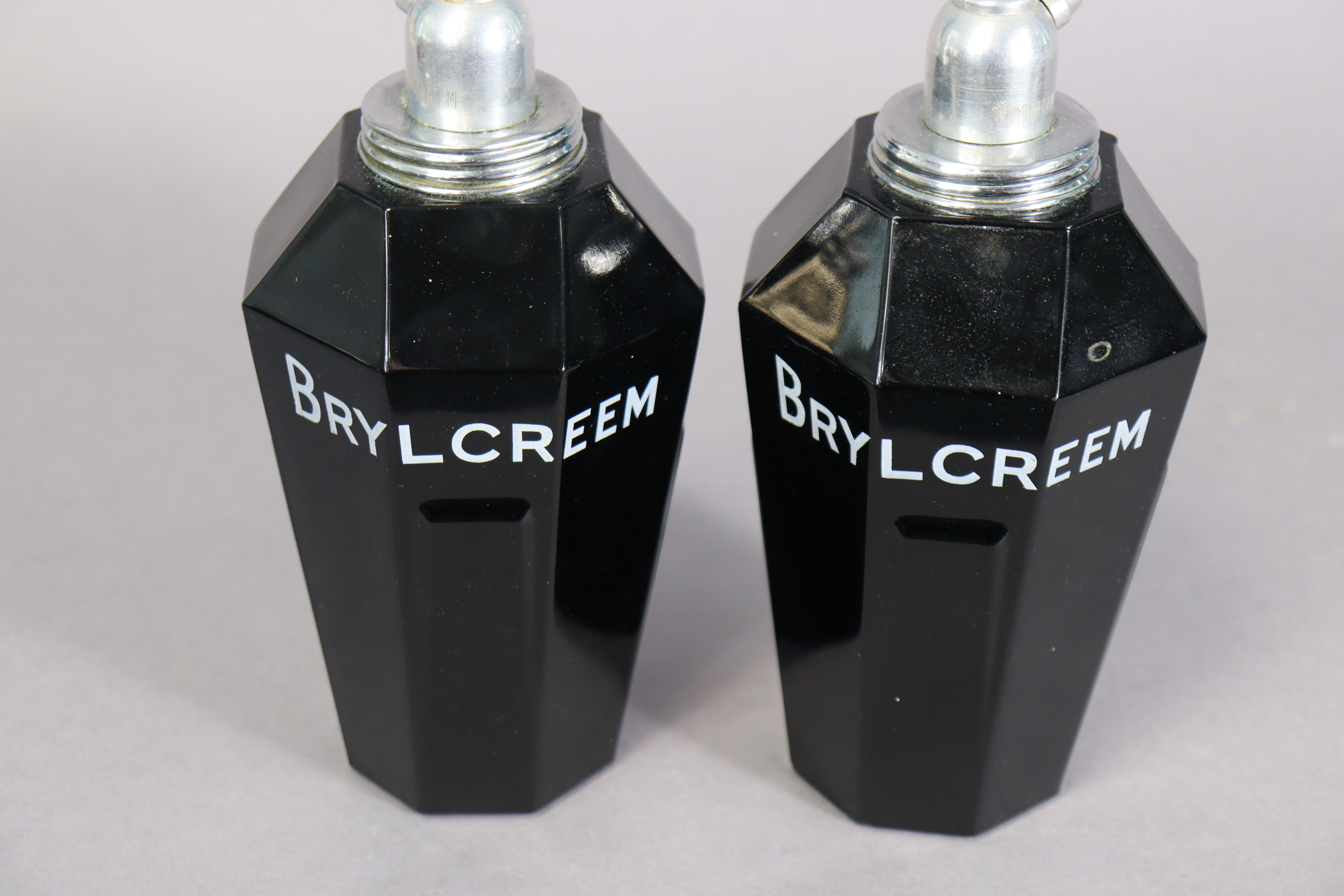 A pair of mid-20th century “BRYLCREEM” opaque-glass barber’s dispensers, 25cm high. - Image 4 of 5