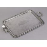 A 1920’s large silver plated rectangular two-handled tea tray with pie-crust border & with