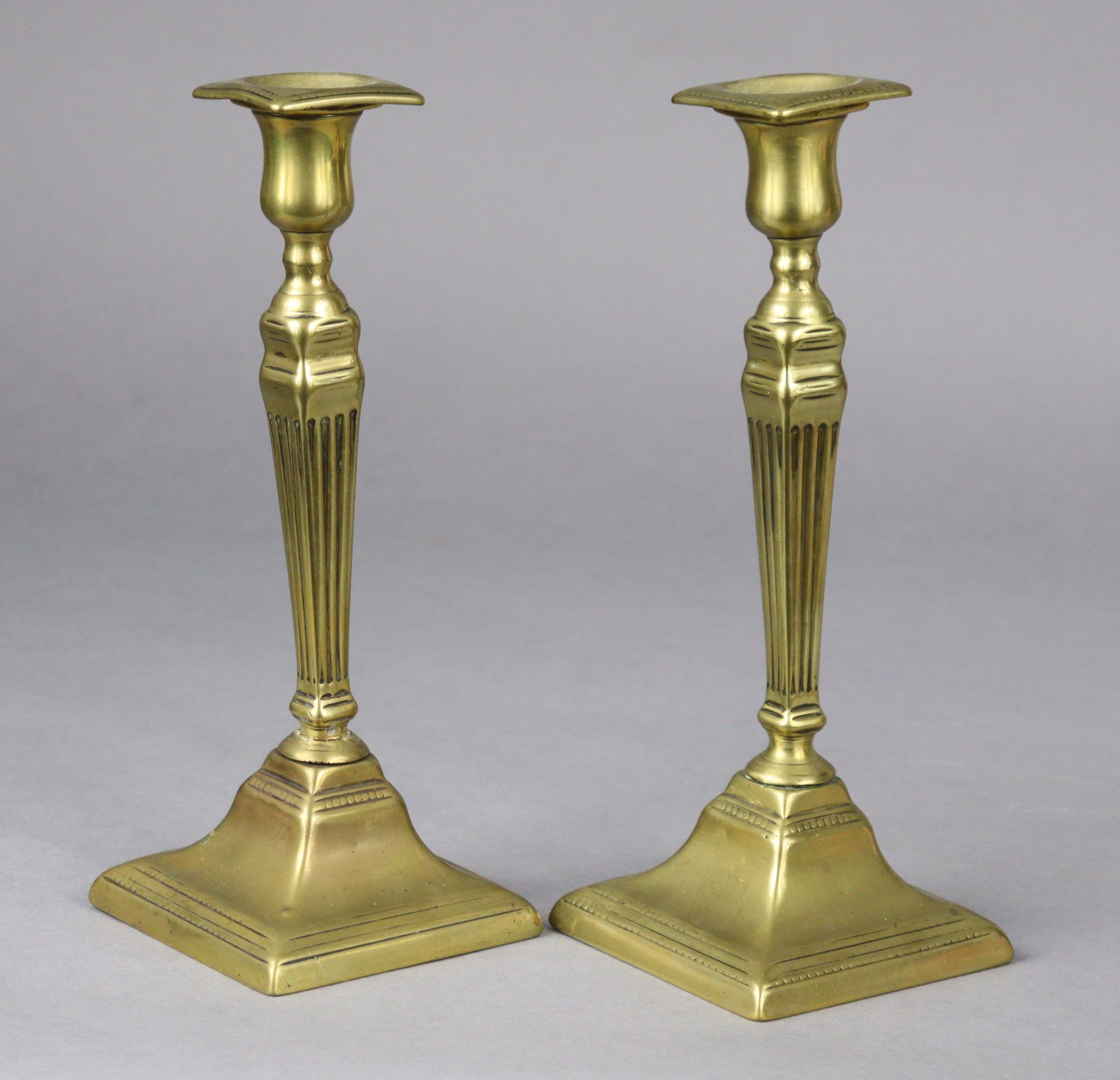 An 18th century brass candlestick, 20cm high; two pairs of Victorian candlesticks, 26.5cm & 24.5cm - Image 2 of 8