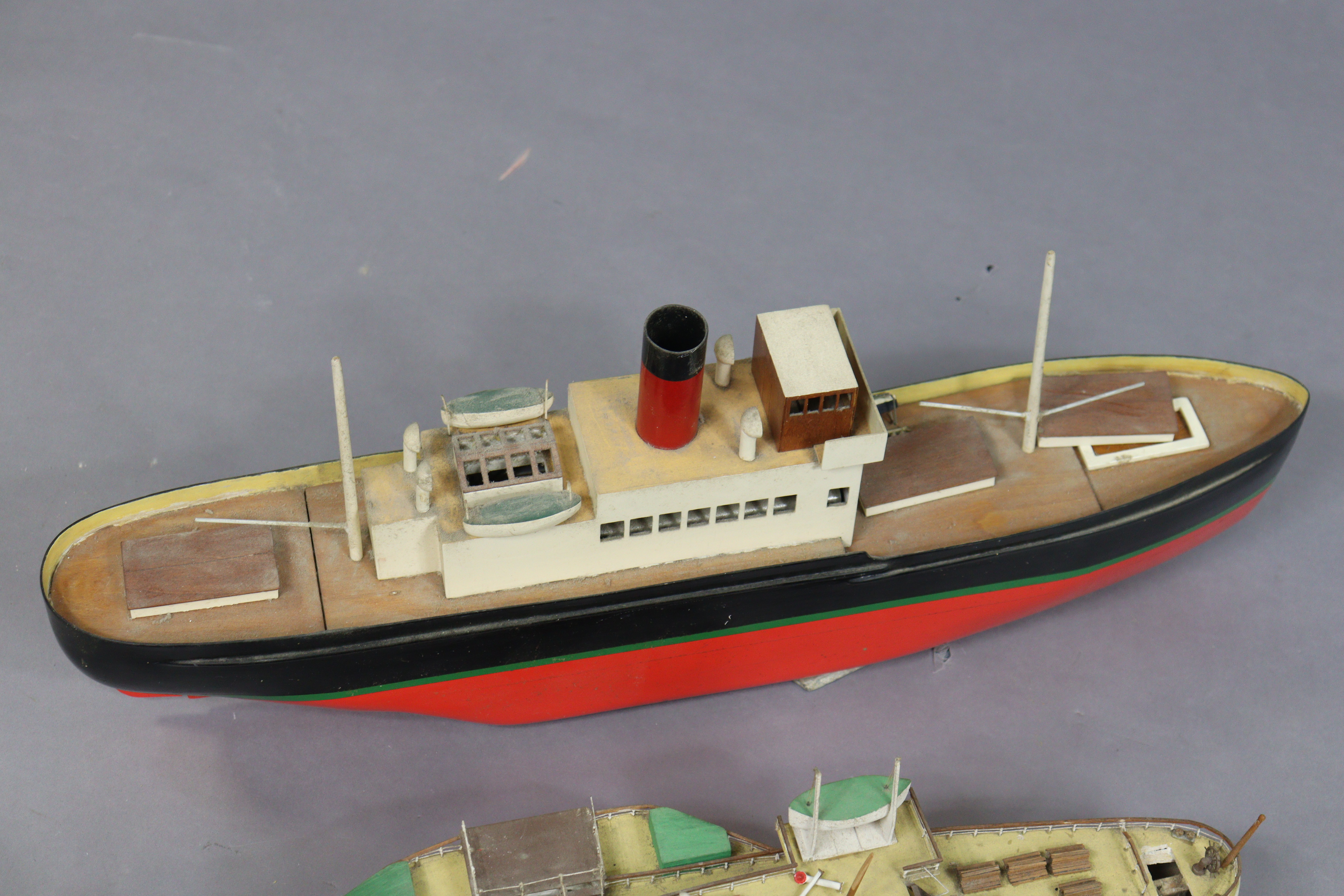 A painted wooden & metal model steamboat fitted with a Mamod engine, 69cm long, and a painted wooden - Image 3 of 7