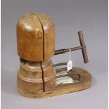 Another late 19th/early 20th century milliner’s wooden adjustable hat stretcher with iron