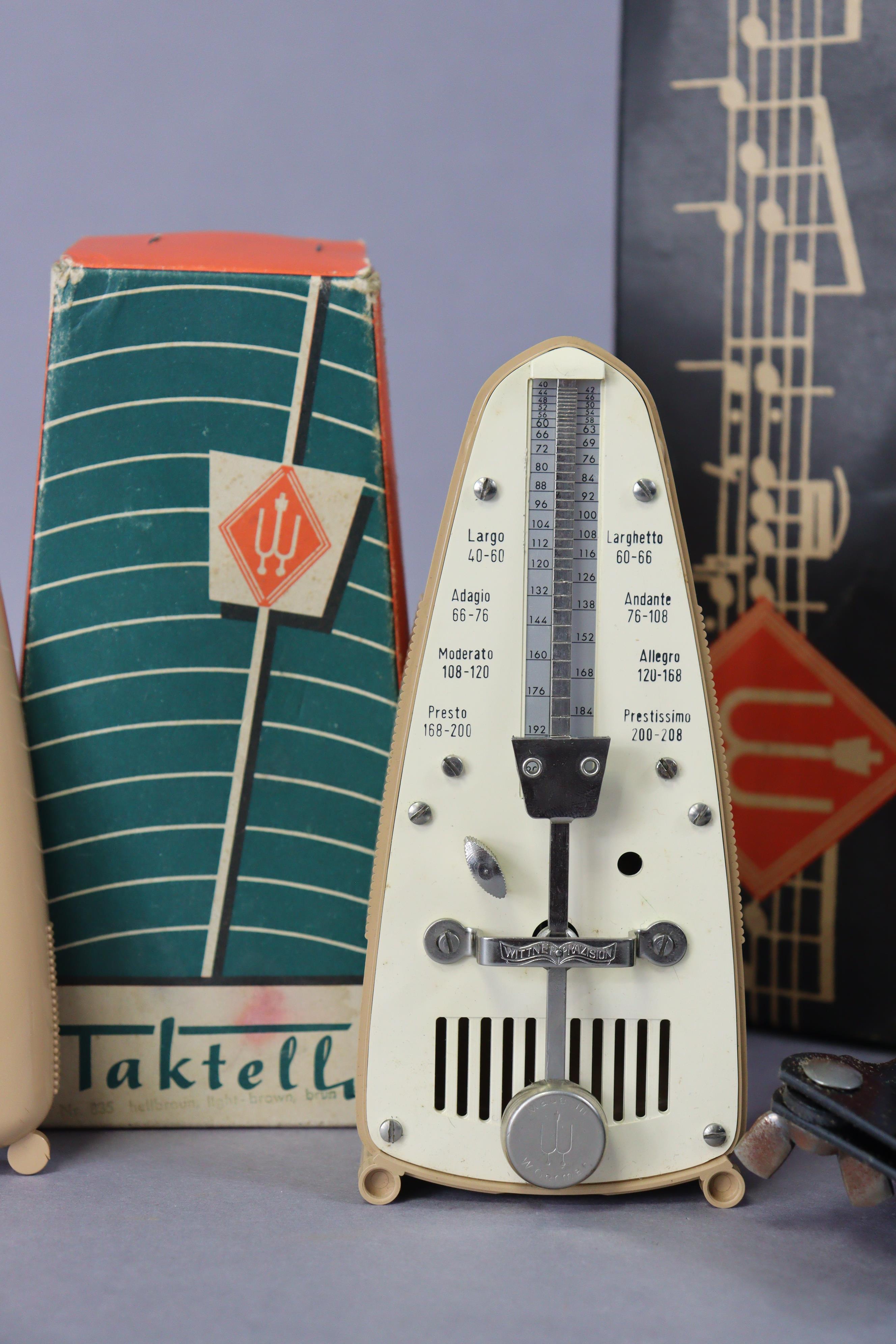 A Taktell (German) metronome; and a Witther sheet music stand, both boxed. - Image 2 of 5