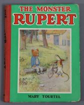 One volume “The Monster Rupert” (1932), and forty-eight various “Rupert” annuals.