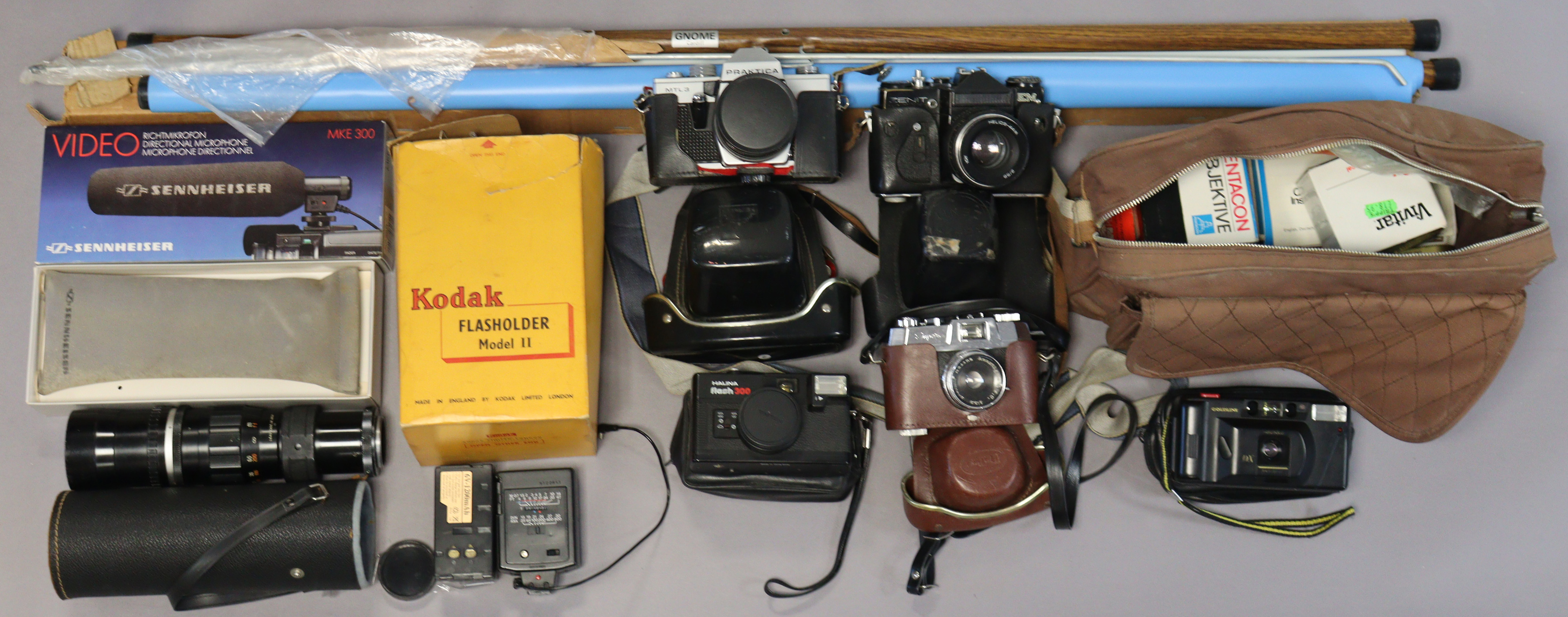 A Praktica “MTL3” camera, together with five other cameras, & various camera accessories.
