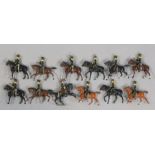 Twelve Britain’s painted lead equestrian soldier figures.