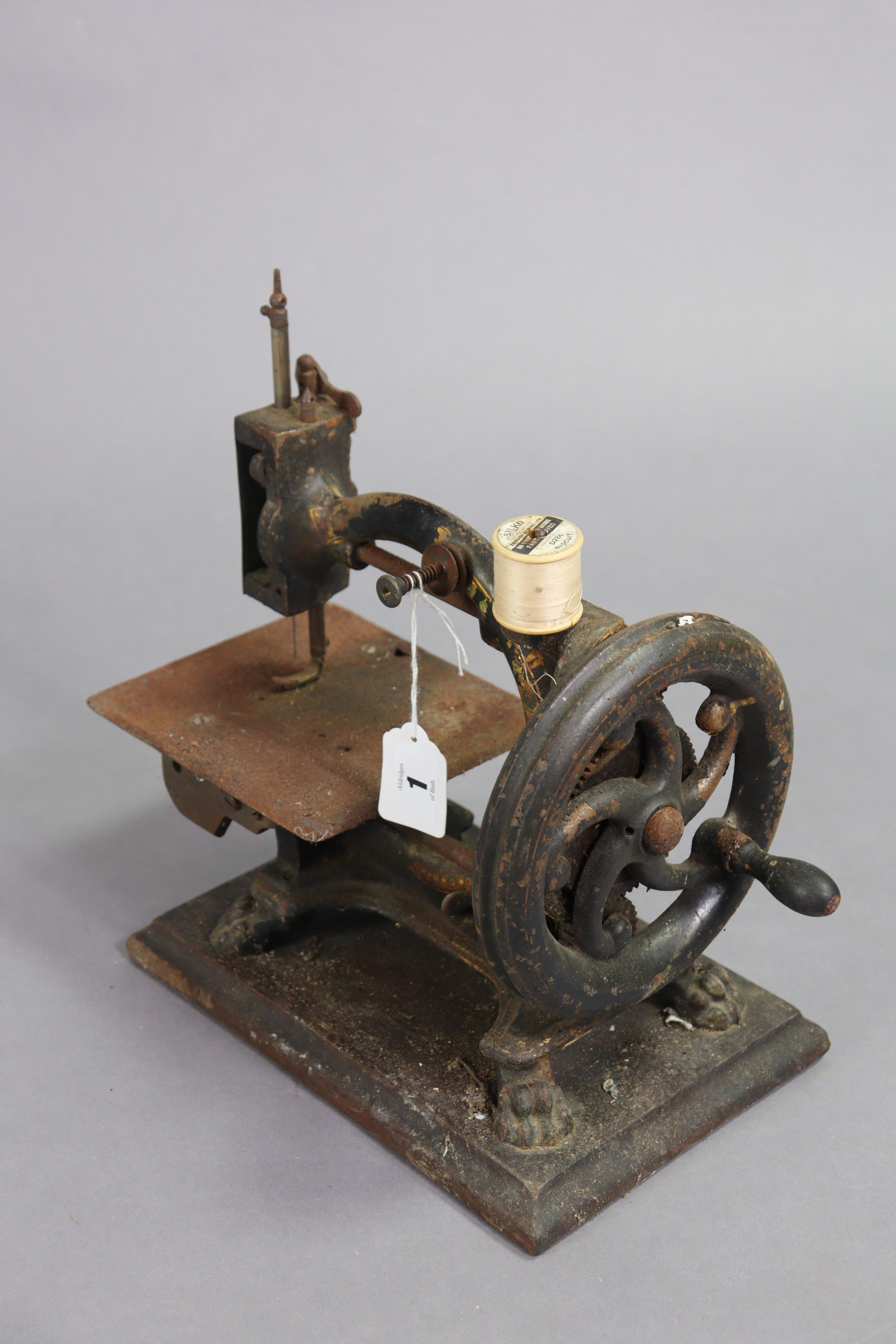 A late 19th century “Monarch” sewing machine by Smith & Co. of London, 28.5cm long, uncased. - Image 4 of 5