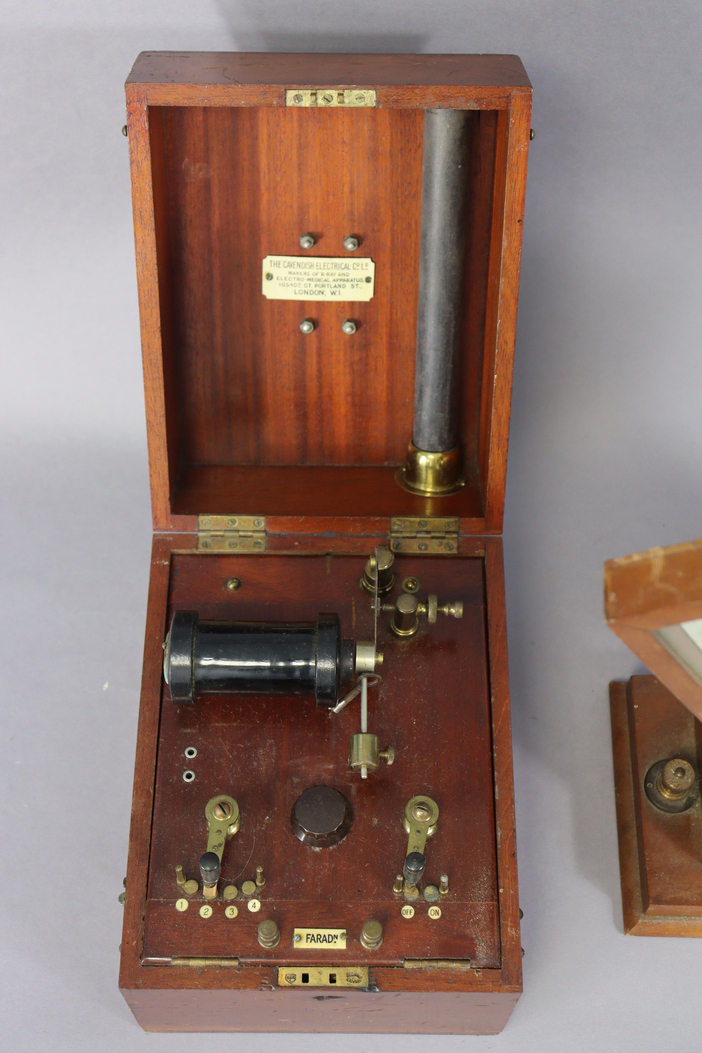 A vintage electric-shock instrument by the Cavendish Electrical Co of London in a mahogany case, and - Image 2 of 8