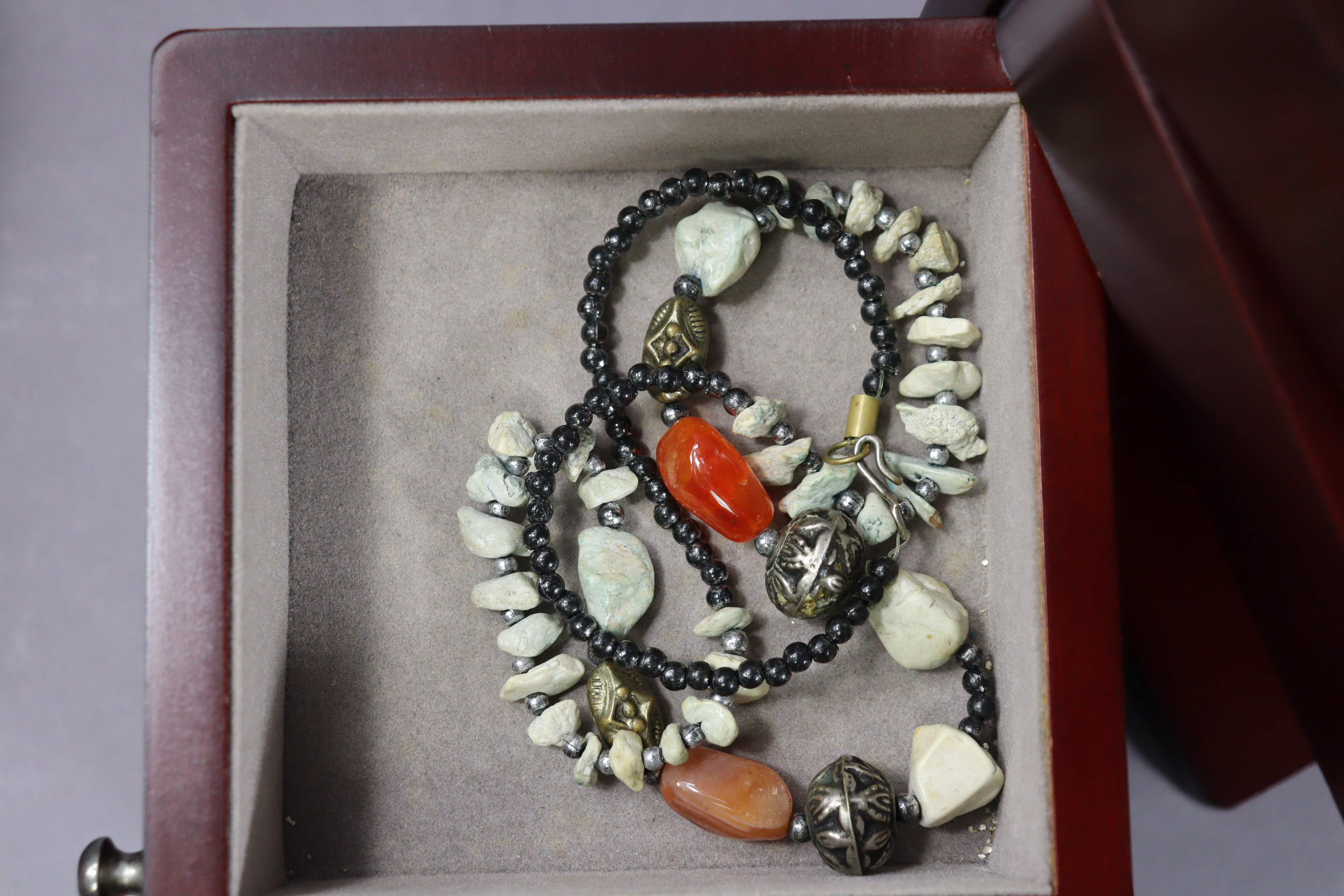 A collection of various bead necklaces including coral, turquoise, malachite, etc., contained in a - Image 7 of 14