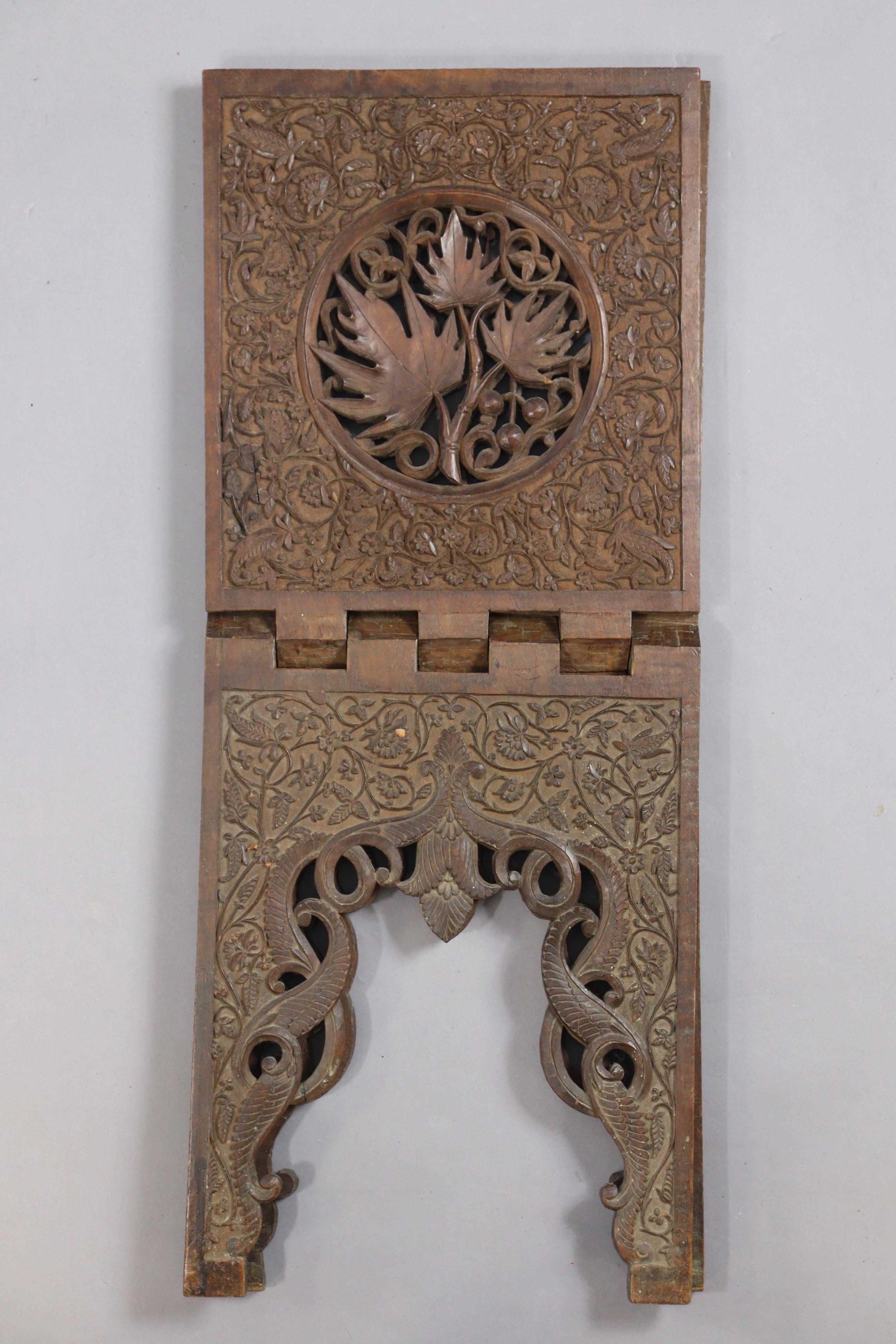 An Eastern carved hardwood fold-away bookstand, 56cm wide x 52cm high; together with a Victorian - Image 4 of 6