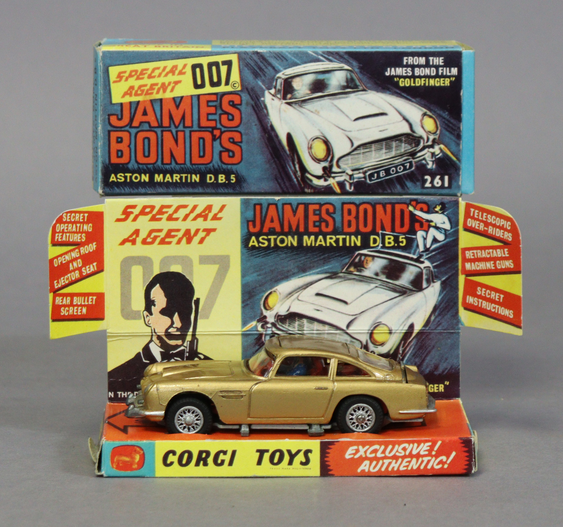 A replica corgi die-cast scale model of “james bond’s aston martin d.b.s” with secret