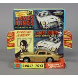 A replica corgi die-cast scale model of “james bond’s aston martin d.b.s” with secret