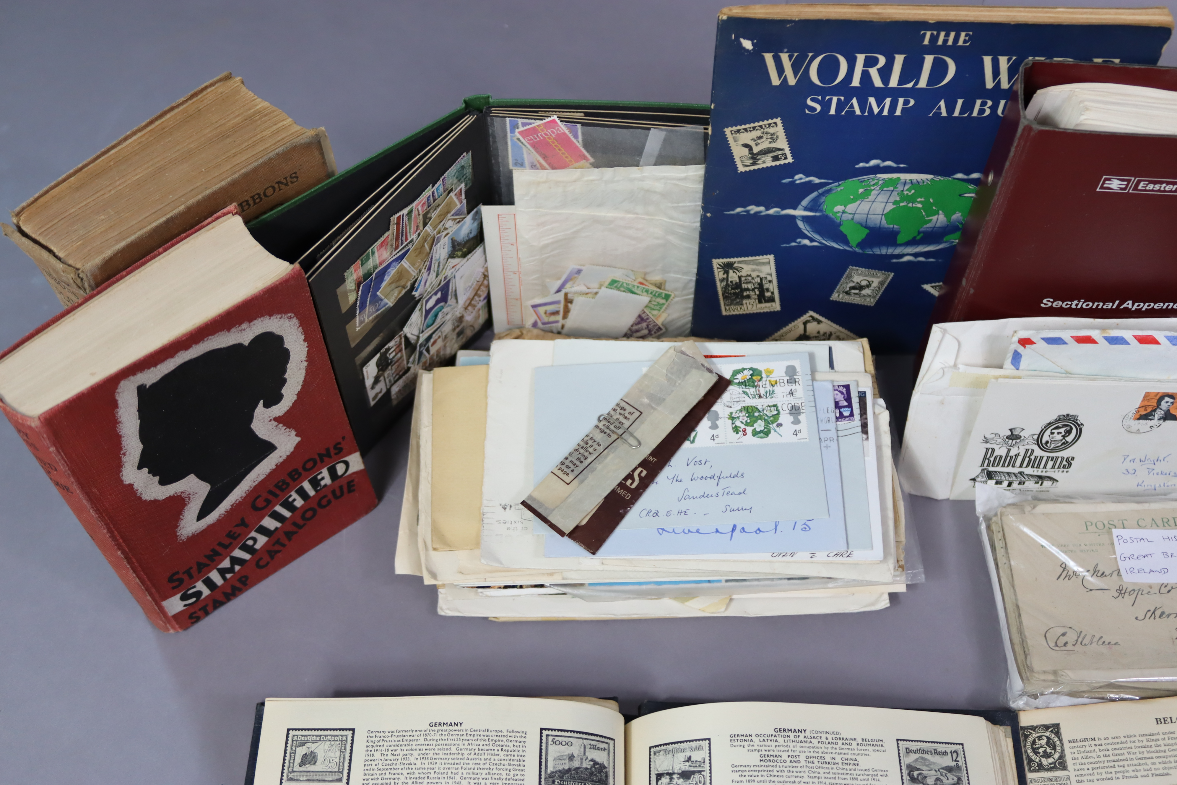 A collection of world stamps in three albums & a stock-book; a quantity of loose stamps; various - Image 5 of 5