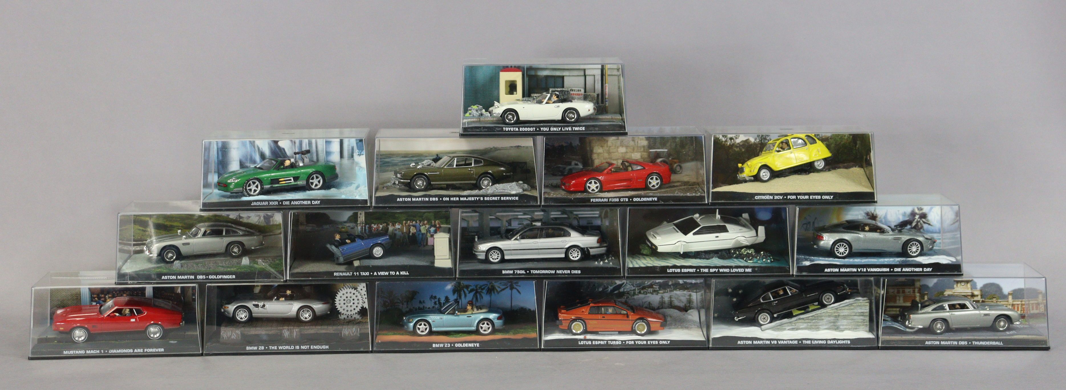 Sixteen “James Bond” car collection scale models, each with a window box.
