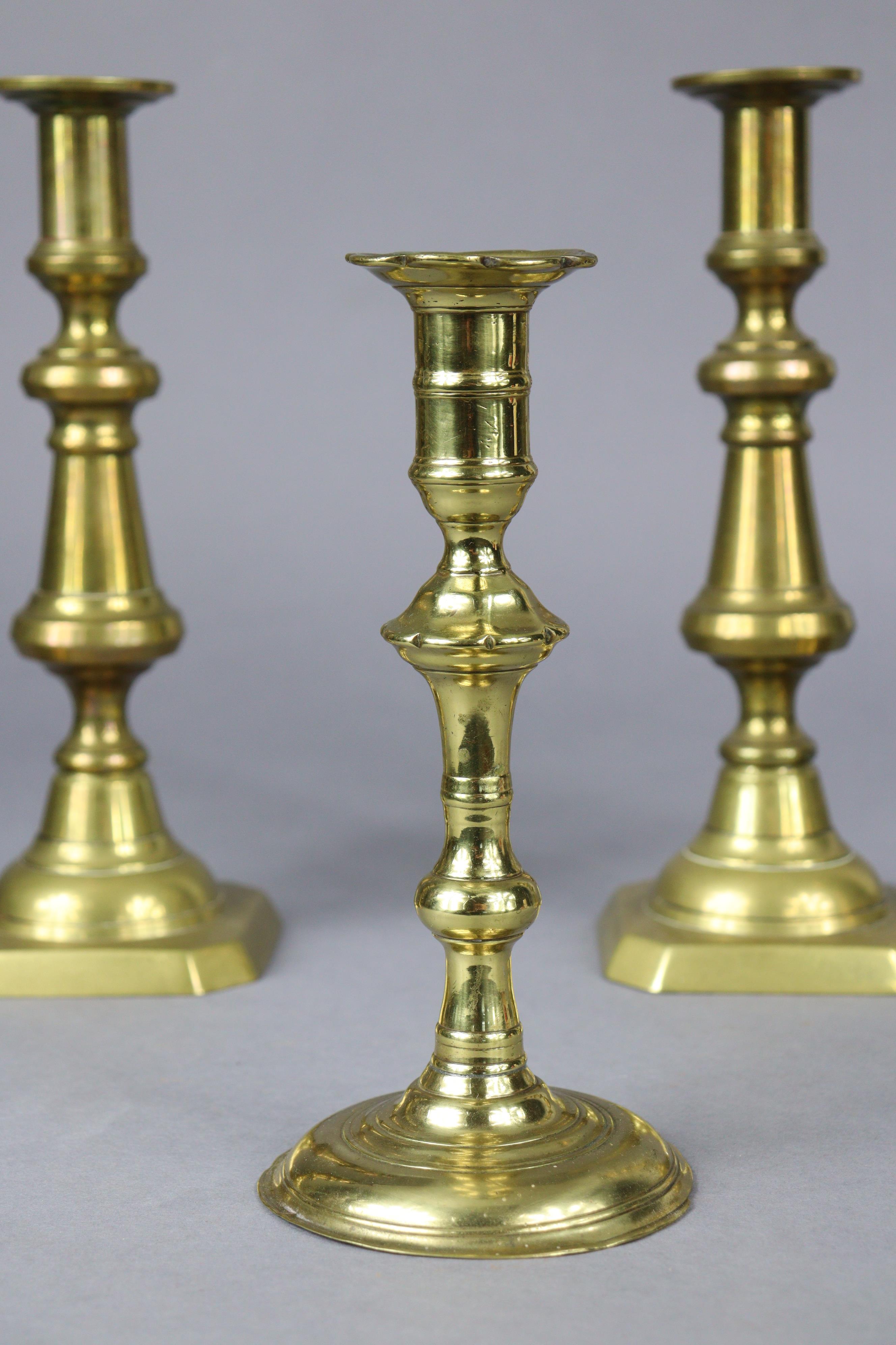 An 18th century brass candlestick, 20cm high; two pairs of Victorian candlesticks, 26.5cm & 24.5cm - Image 6 of 8