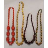 Four various coloured bead necklaces.