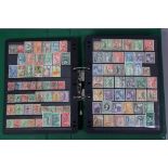 A collection of GB commonwealth & world stamps on stock leaves, in a ring-binder album.