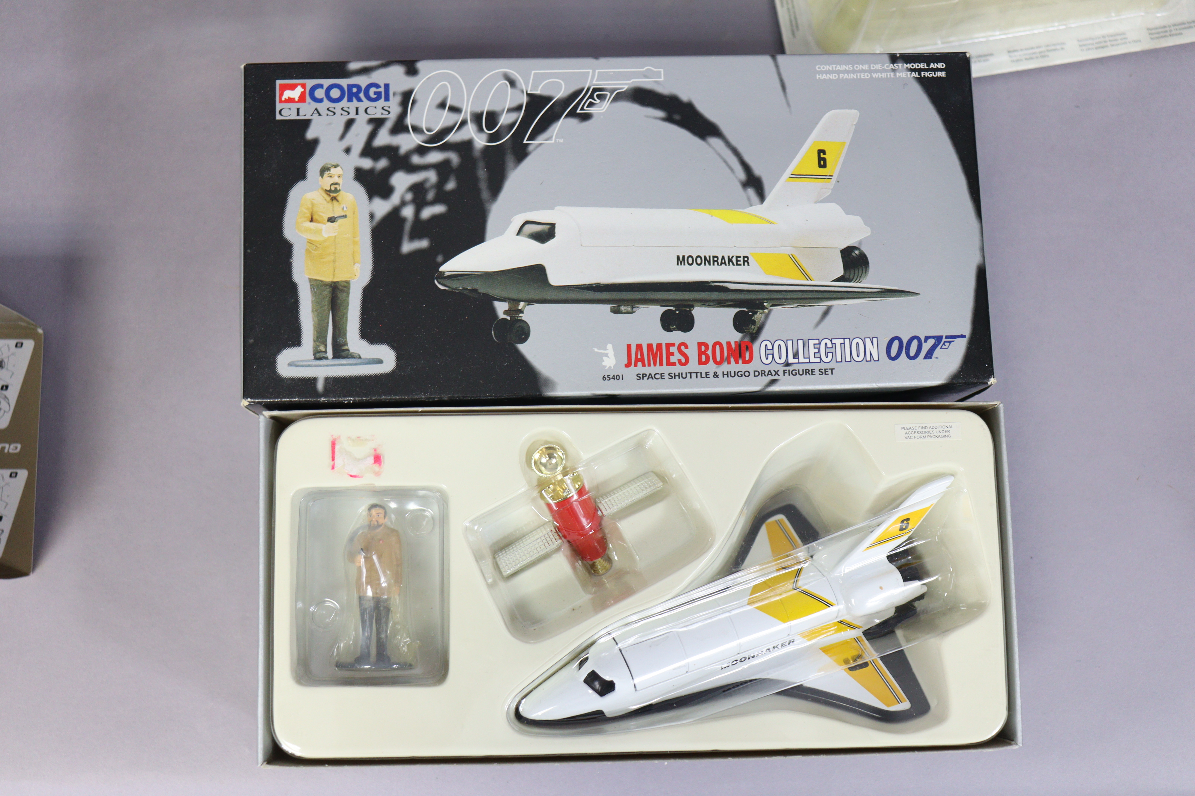 A Corgi die-cast scale model of James Bond Aston Martin DBS (from the movie Thunderball); a ditto - Image 4 of 4