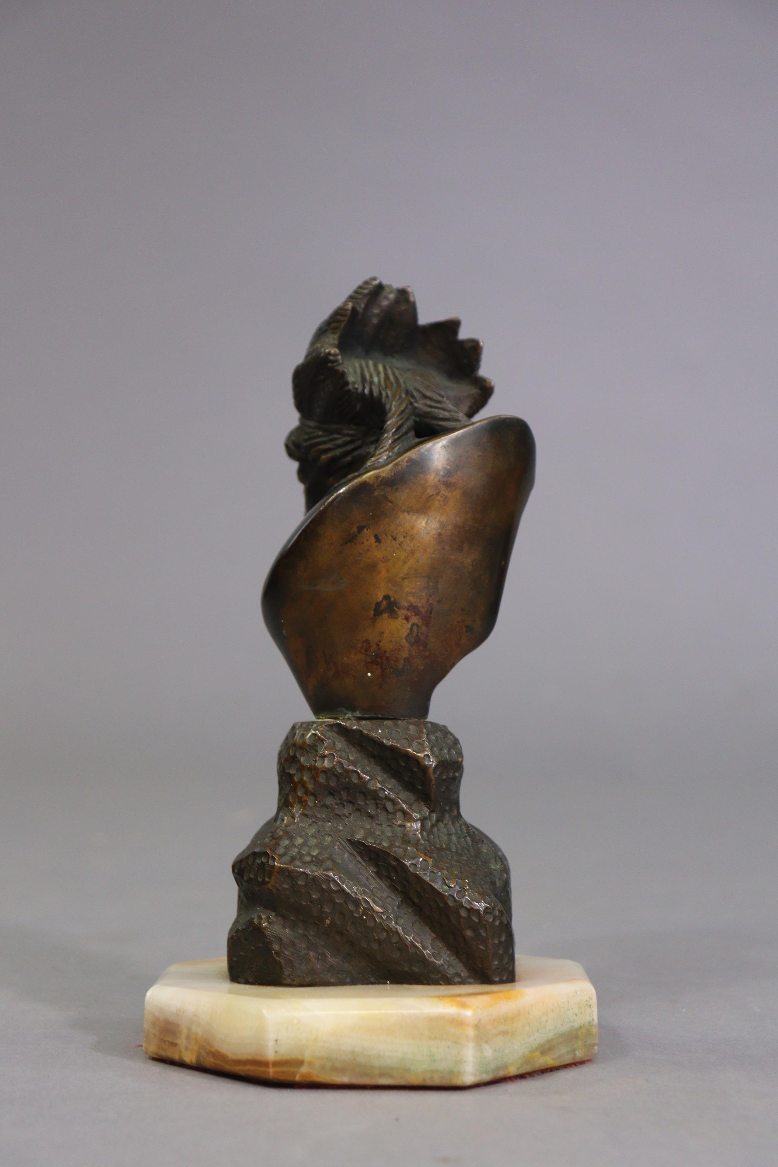 A bronzed Indian chief’s bust sculpture mounted on an onyx octagonal plinth, 22cm high. - Image 4 of 6